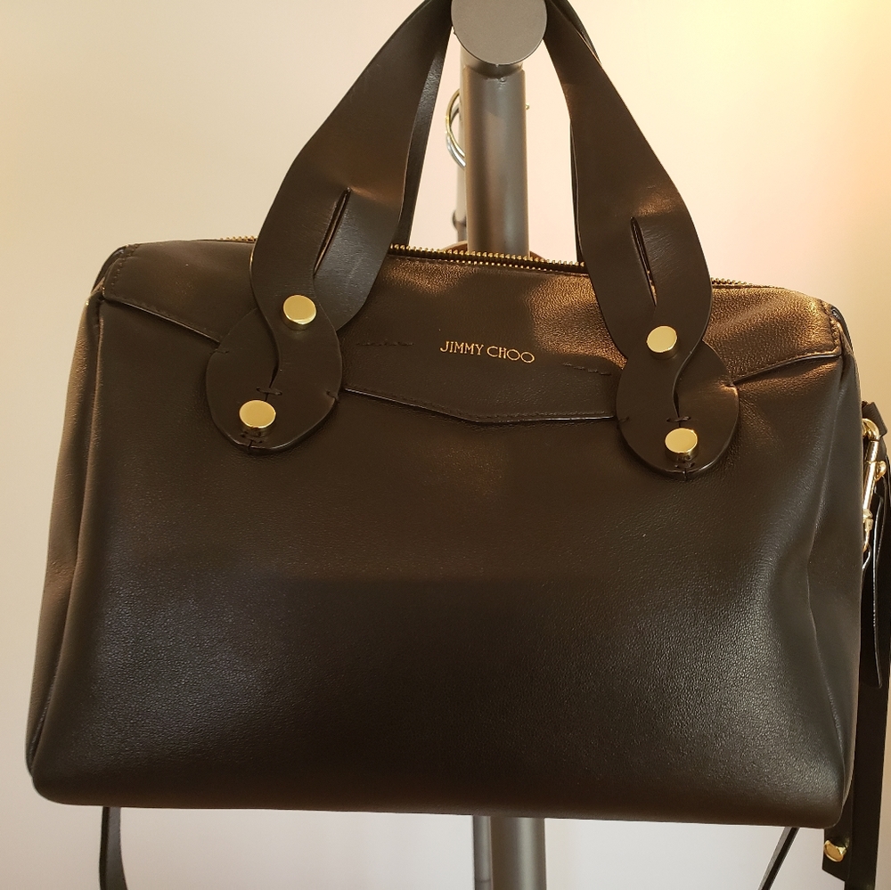 Jimmy Choo purse..black, purple interior